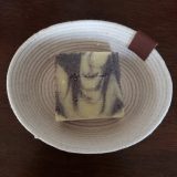 Body bar soap close up showing creamy texture